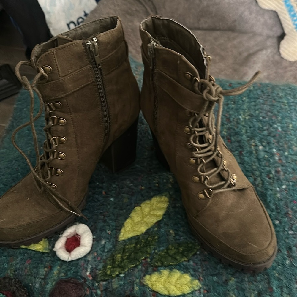 Lace up ankle boots. Great condition. one nick on each toe box.